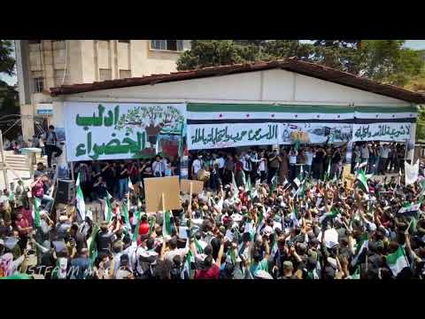 مظاهرة في مدينة إدلب 2021 بدنا أصابع نصر نرفعها فوق القصر لا شرعية للأسد وانتخاباته