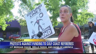 Protesters gather in Ashland outside of banks in opposition to pipeline funding
