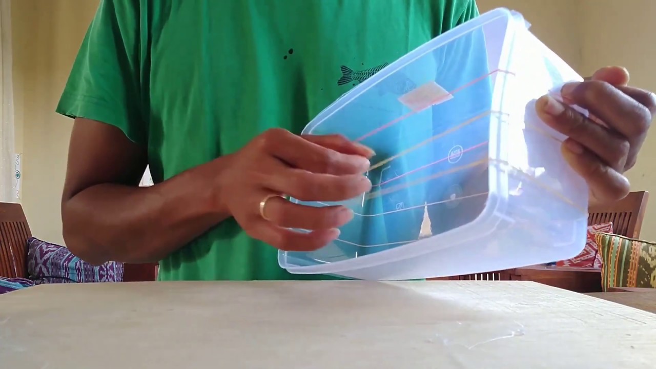 HOW TO MAKE A VERY EASY RUBBER BAND INSTRUMENT USING A PLASTIC ...