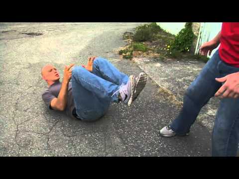 Most self-defense fights eventually end up on the ground, so don’t panic if your opponent drags or knocks you down. Most people are pretty clueless about ground fighting, so even a little wrestling, Judo, or BJJ makes you much more dangerous than the average person.

If you end up on the bottom, prevent your attacker from posturing up by holding on to them. Look to sweep to a more dominant position or get back on your feet. A self-defense situation isn’t the ideal time to look for submissions off your back, so avoid going for submissions on your back unless you’re confident you’ll secure it. Getting slammed on concrete as you work for submissions off your back can get you in a world of trouble.

 