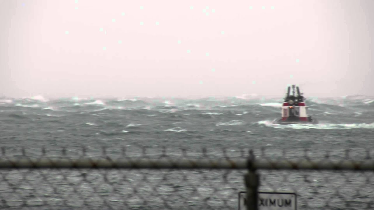 Tug heading out into stormy seas. YouTube