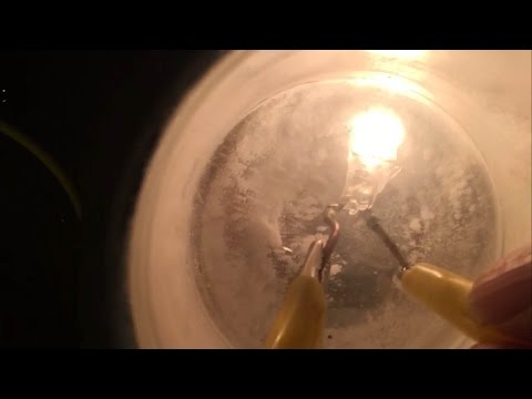 Broken Lightbulb On Under Liquid Nitrogen