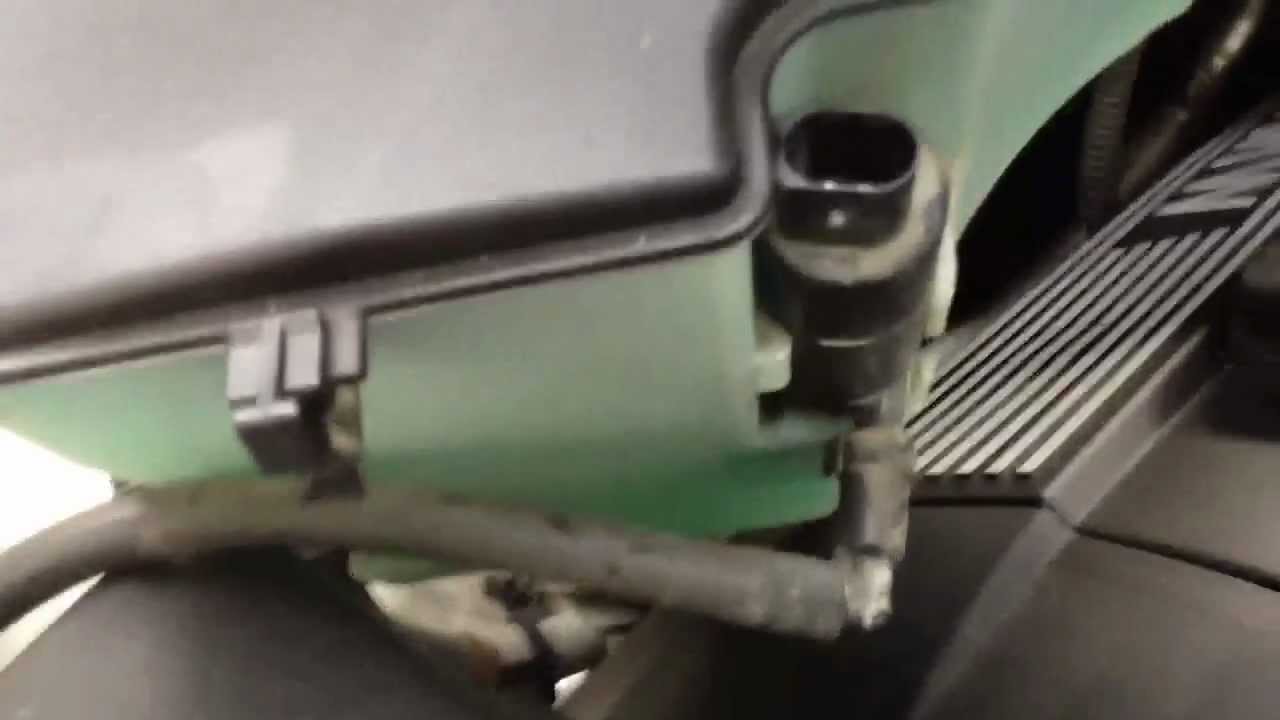 How to install a headlight bulb in a bmw X3 on the passenger side x5