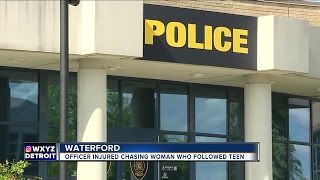 Officer injured chasing woman who followed teen
