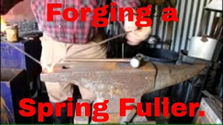 Forging a spring fuller.
