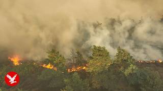 Drone footage captures England wildfire after evacuations