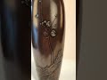 A Meiji period bronze vase by Yoshiharu
