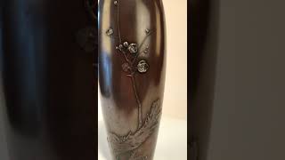 A Meiji period bronze vase by Yoshiharu A Meiji period bronze vase by Yoshiharu