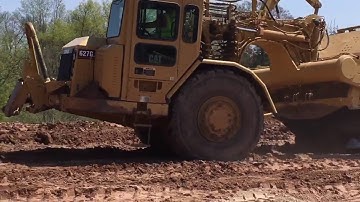 New Subdivision Construction - Grading with 627G Caterpillar Scraper