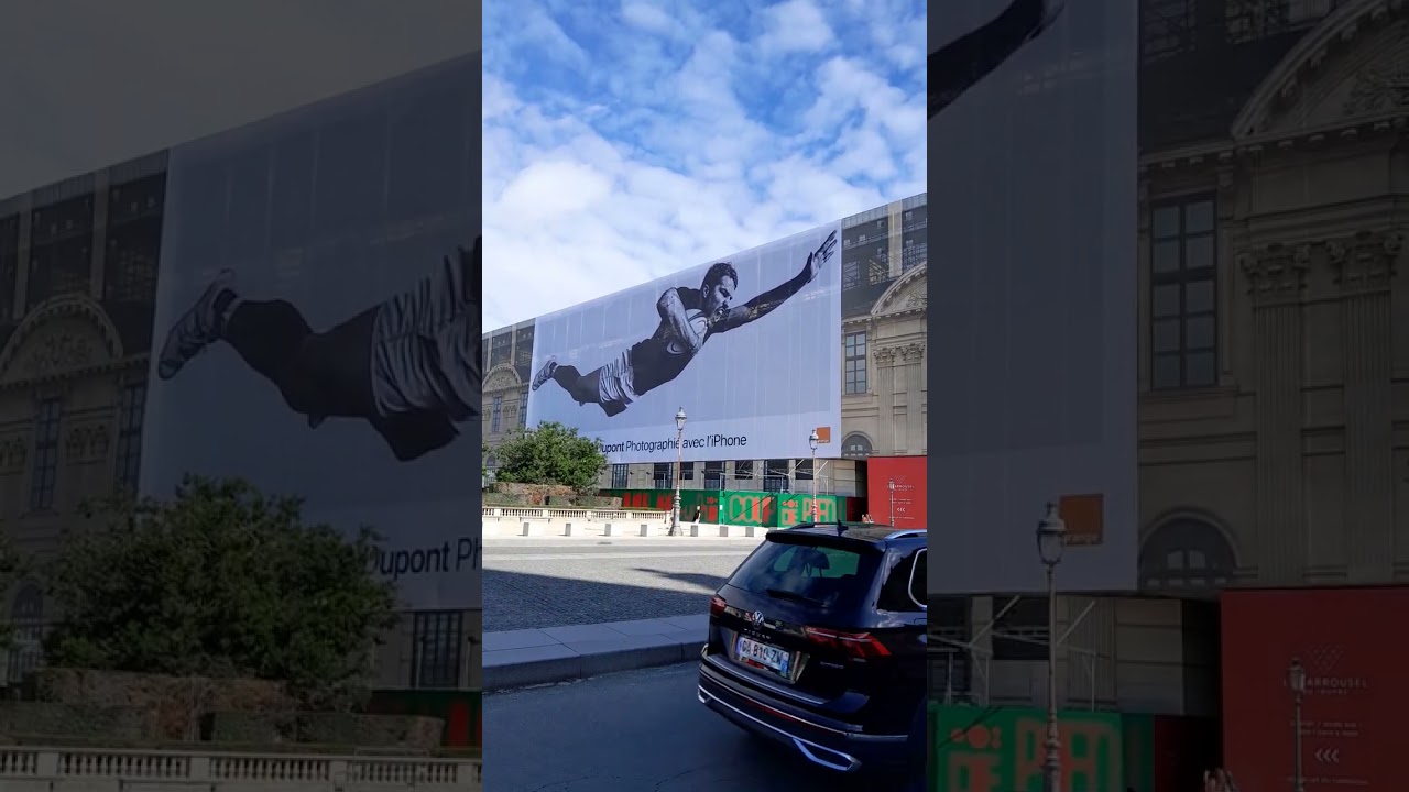Billboard (The flying man) about Rugby on the Louvre: 15 August 2023