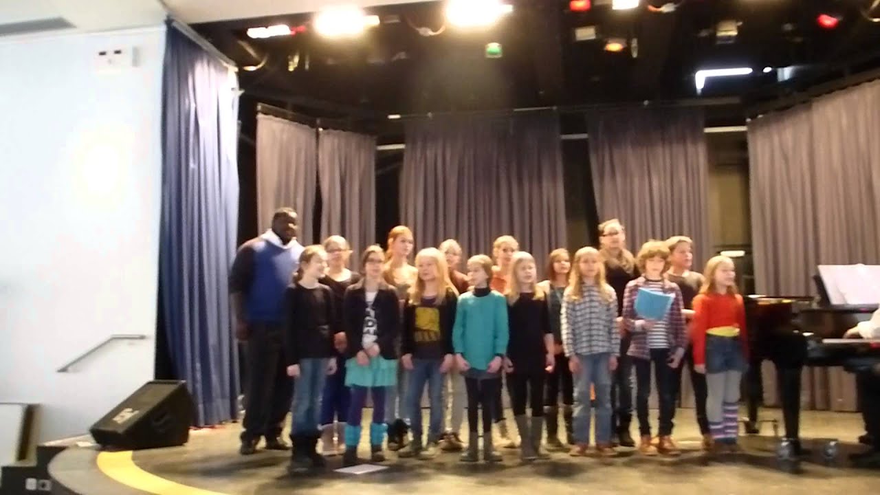 2013 COST student with elementary choir group, Germany