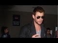 Chris Hemsworth Can Barely Make It Through The Fans At LAX