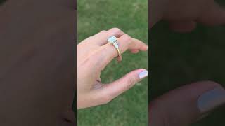 Emerald cut bezel diamond engagement ring with bullet shaped side diamonds. #emeraldcutdiamond