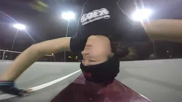 Bgirl Spinderella Head spins while skateboarding at the same time