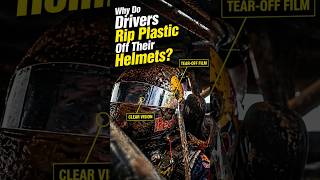 Why do car drivers always peel off the layer on their helmet visors?#driver #racing