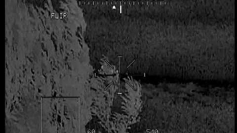 Apache win, insurgent fatality head w/spine WARNING GRAPHIC