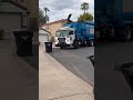 2825 one of Gilberts N2 Amrep garbage trucks collecting trash in 85233