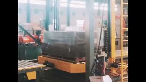 Vertical pallet strapper packaging line