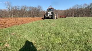White 4-150 plowing hay field
