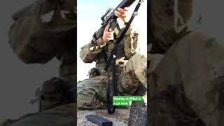 Shooting an M16 in a gas mask (it’s kinda annoying) #shorts