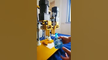 Tabletop pump cap tightening machine
