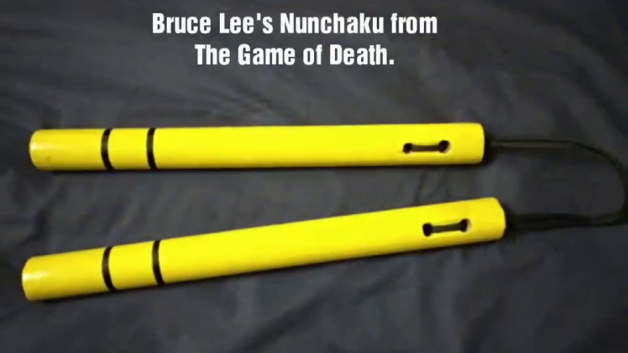 bruce lee yellow nunchucks