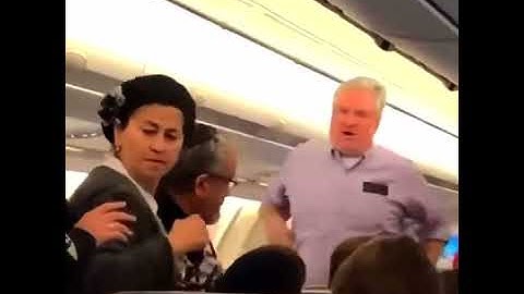 stan twitter: man on plane aggressively says "i want to shake your hand"