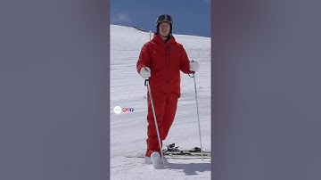 How to put my skis on whilst standing on a steep slope | SkiCoachingOnline | How to ski videos