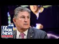 Manchin faces harsh backlash from Democrats for opposing election bill