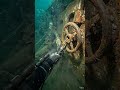 Skeleton Chained to Submerged Train Safe Door Wheel (Flooded Rail Car)”