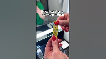 simple way to test for two way mirrors in hotels: If the band aid curves it