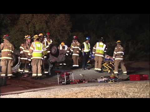 RESCUE: JAWS OF LIFE FREE WOMAN TRAPPED IN OVER-TU...