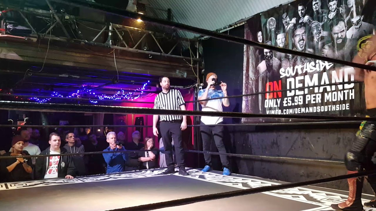 Rey Horus and Sean Kustom fly from the top rope