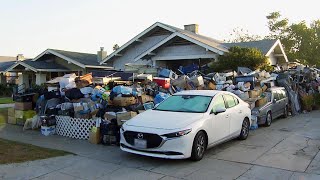 Hoarder’s Yard Has 8-Foot-Tall Wall of Junk