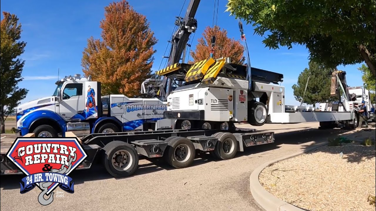 Lifting and hauling a 58,000 lb Cargo Loader | Rigging 101 - YouTube