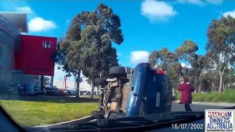 Car runs red light and flips Jeep - Bundoora VIC