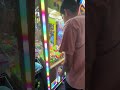 Claw Machine Green Sea Lion win at Mirror Maze at Pier Park in Panama City Beach FL