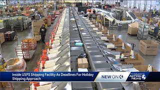 Inside USPS shipping facility as deadlines for holiday shipping approach