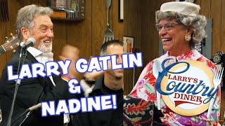 NADINE brings LARRY GATLIN his SPEEDO