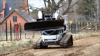 Гусеничный погрузчик Bobcat с бульдозерным отвалом