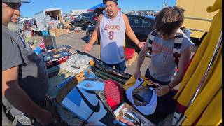 SPENDING MONEY ON A BAG OF RARE SNEAKERS AT THE FLEA MARKET. ALMOST MISSED THE NFL FOOTBALL JERSEYS!
