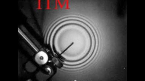 Instantaneous time mirror of a point water wave source.