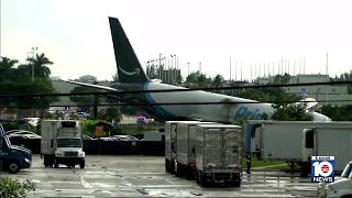 Recovery efforts continue following cargo plane going off MIA runway, killing 5 screenshot 3