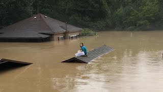 WATCH: Young girl, dog stranded on roof in eastern Kentucky during deadly flood