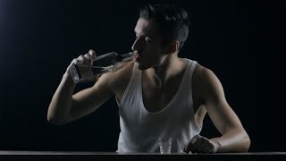 Depressed Man Drinking Vodka In a Dark Room | Stock Footage