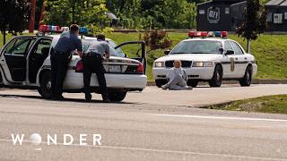 Why Did a Pizza Delivery Driver Rob a Bank With a Bomb Around His Neck?
On August 28, 2003, a quiet afternoon in Erie, Pennsylvania, turned into a nightmare when pizza delivery driver Brian Wells walked into a PNC Bank with a live explosive locked around his neck and a cane modified into a shotgun. What began as an extraordinary bank robbery quickly unfolded into one of the most complex, twisted cases in FBI history.
Licensed to Little Dot Studios.
Subscribe to WONDER to watch more documentaries: https://www.youtube.com/WonderDocs
Follow us on Facebook: https://www.facebook.com/TheWonderChannel
WONDER is packed with binge worthy reality documentaries for hours of entertainment. Check out our hub of diverse and empowering stories which explore the extreme side of life! Why Did a Pizza Delivery Driver Rob a Bank With a Bomb Around His Neck?