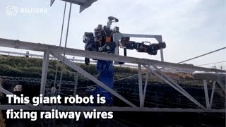 Japan's giant robot fixes railway wires