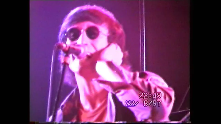 Gary Gibson as John Lennon...