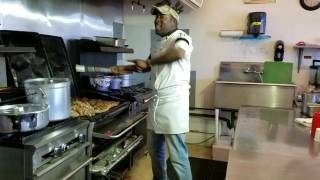 Loading up the grill - Chef Shrimpy (The Jerk Cafe)