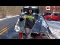 HOW TO GET A CAR OUT OF A DITCH | USING A ROLLBACK TOW TRUCK WITH WINCH AND SNATCH BLOCK.